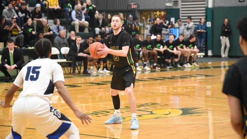 Jordan Fragale #23 getting ready to pass the ball during the running of a play.