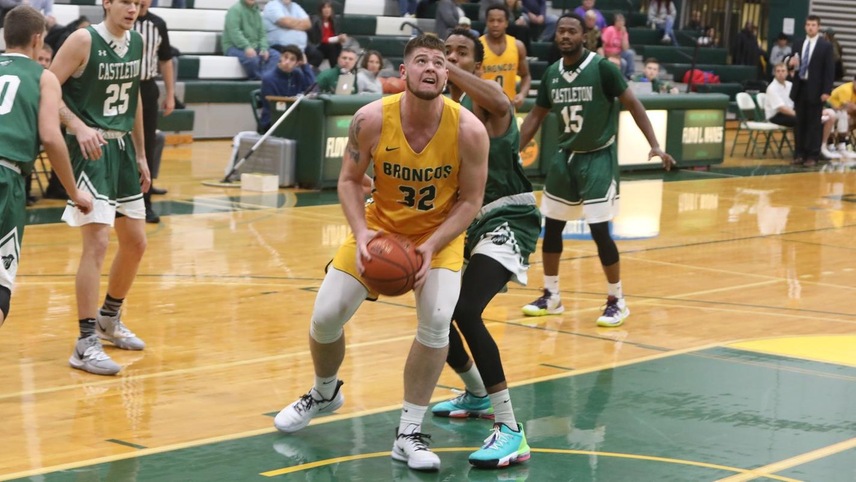 Payton Dean #32 about to jump up for a layup.