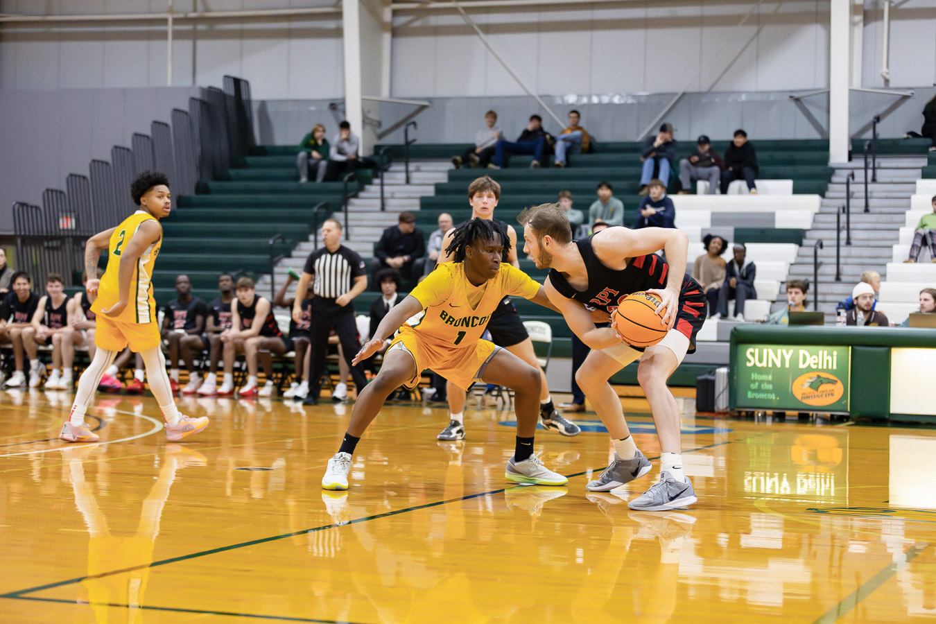 Men's Basketball Shocks Hamilton Behind Ibrahim's 30 Point Night