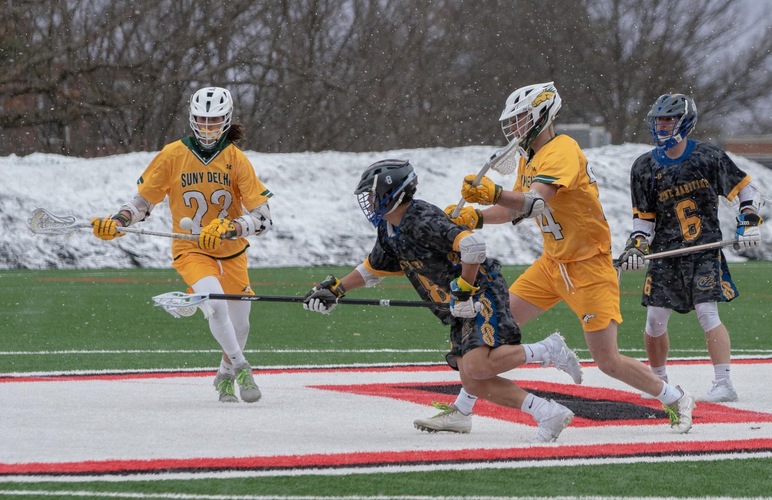 John Rohan and Ryan Cumisky fighting to get the ball on a ground ball opportunity. 