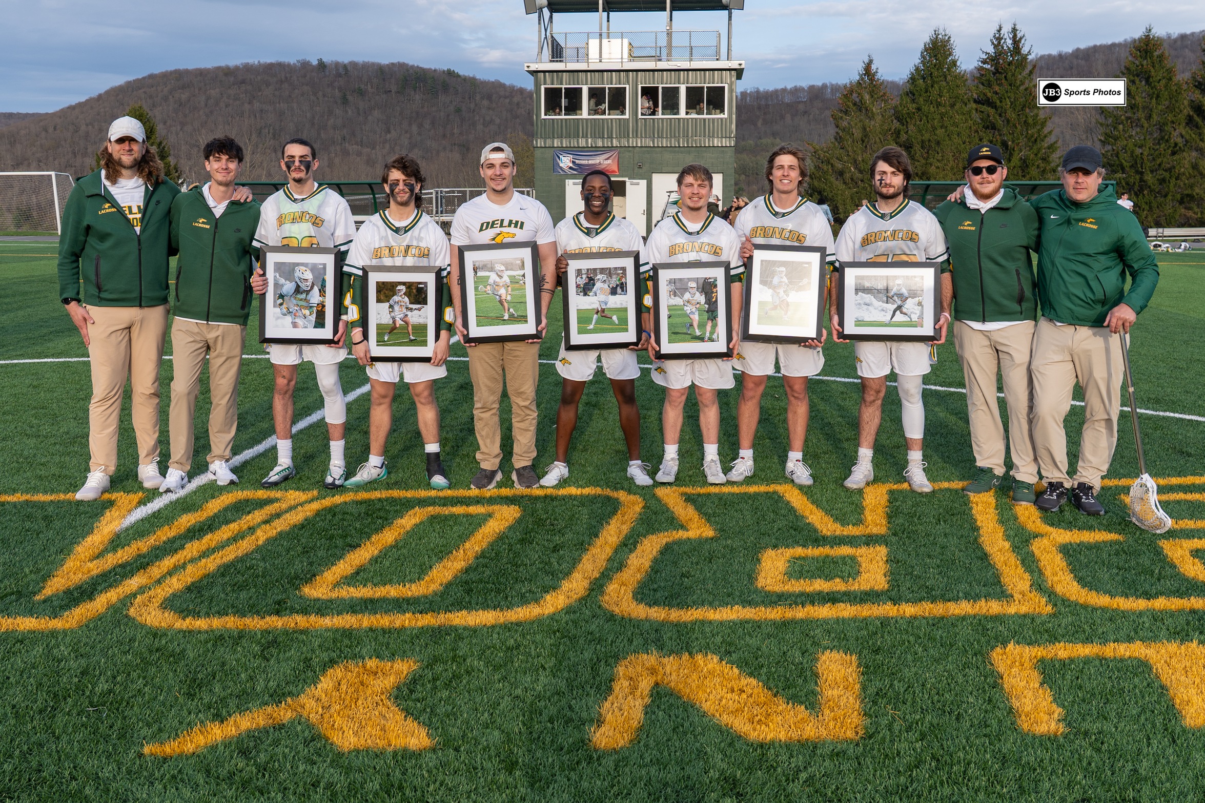The Broncos' 2026 seniors with coaches on Senior Recognition Night