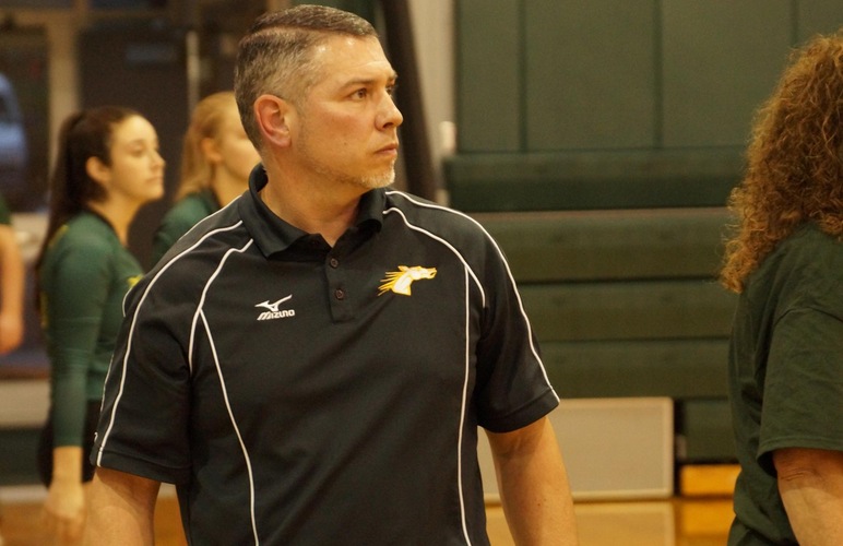 Coach Beau Bracchy looking on during a game.