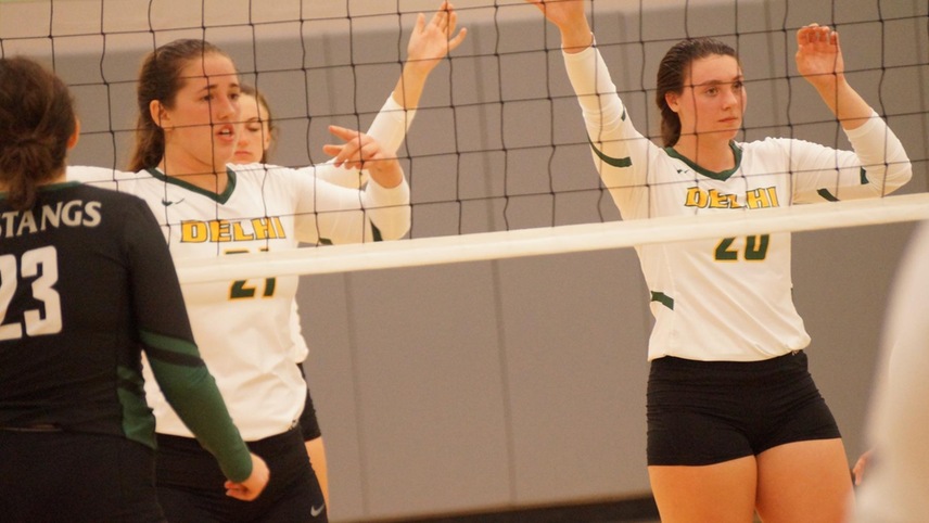 Erica Prindle and Chloe Elsenbeck getting ready for the next play, awaiting for the opposing team's serve.