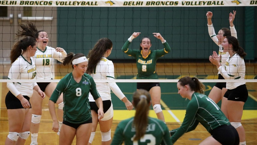 The Broncos celebrate after scoring a point versus Sage.