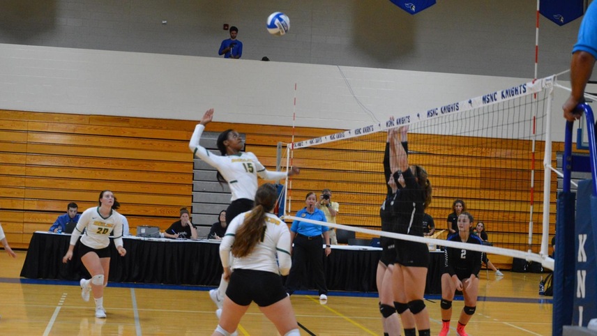 Witchney Clersainville ready to hit the ball over the net.