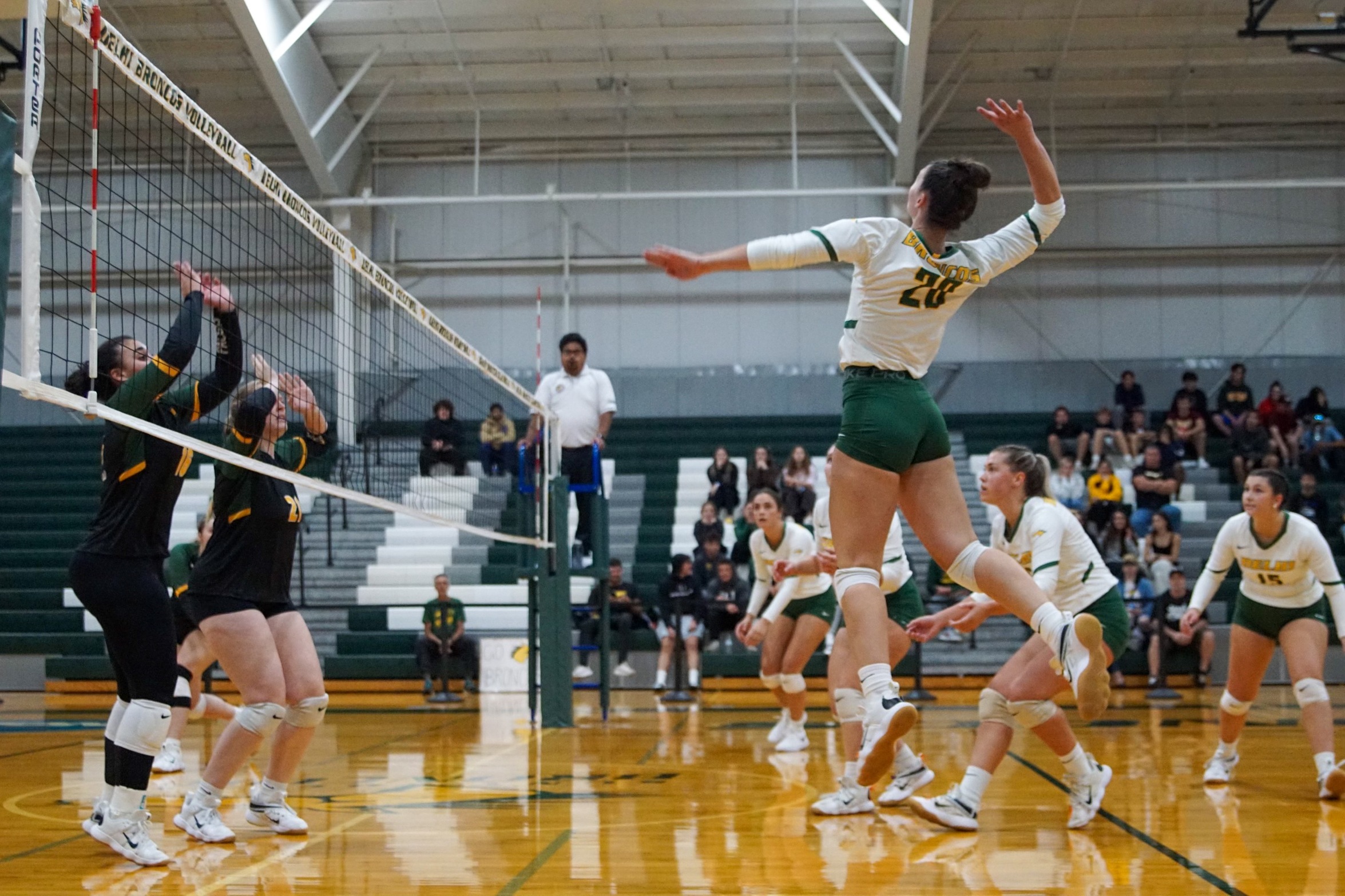 Elsenbeck becomes Delhi's All-Time Ace Leader as Broncos split NAC tri-match at Nazarene